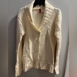 Cream cardigan sweater.